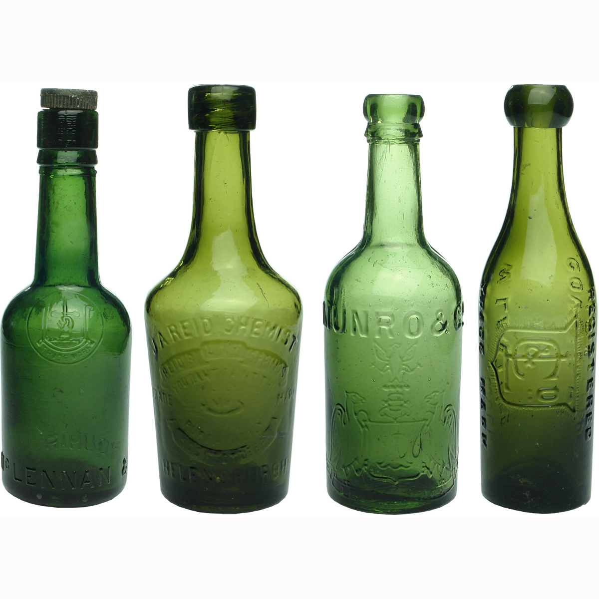 4 UK Bottles: McLennan & Urquhart, Dalkeith; J. A. Reid, Helensburgh; Munro & Co; W. Lant & Co., Coventry.
